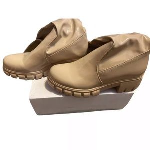 Woman’s thigh high boots